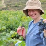 woman holding grapes